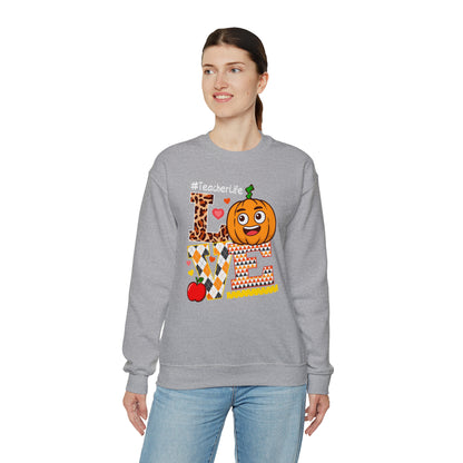 Fall Teacher Sweatshirt, Love and Learning with Pumpkin Charm, Cozy Educator Apparel, Teacher Gift Unisex Heavy Blend™ Crewneck Sweatshirt